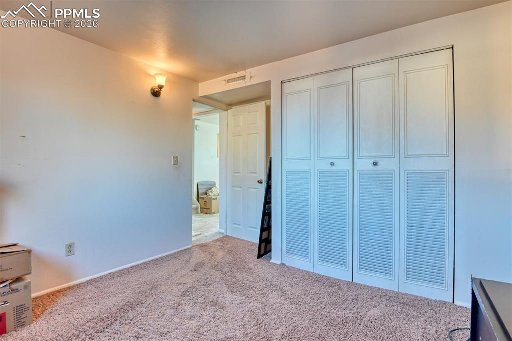 Image 32 of 43: Bedroom