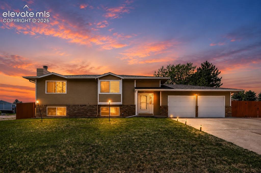 Image 19 of 19: Twilight Front house