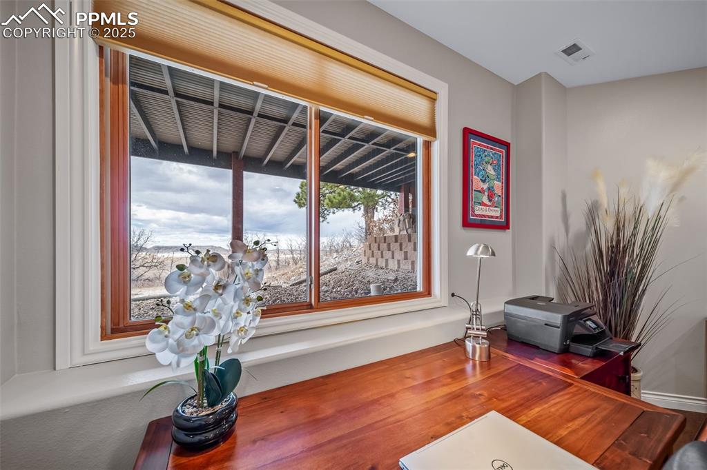 Image 34 of 50: Office view of a desk