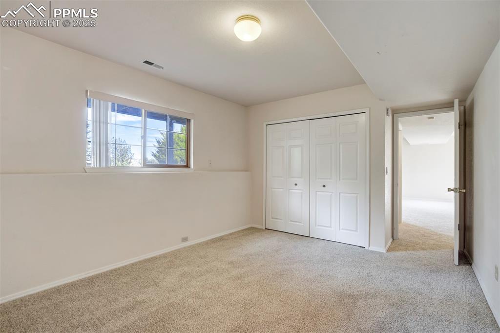 Image 34 of 39: Bedroom