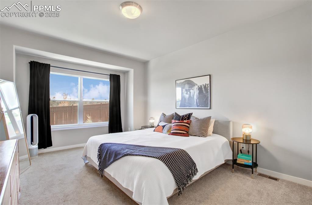 Image 14 of 38: Master Bedroom