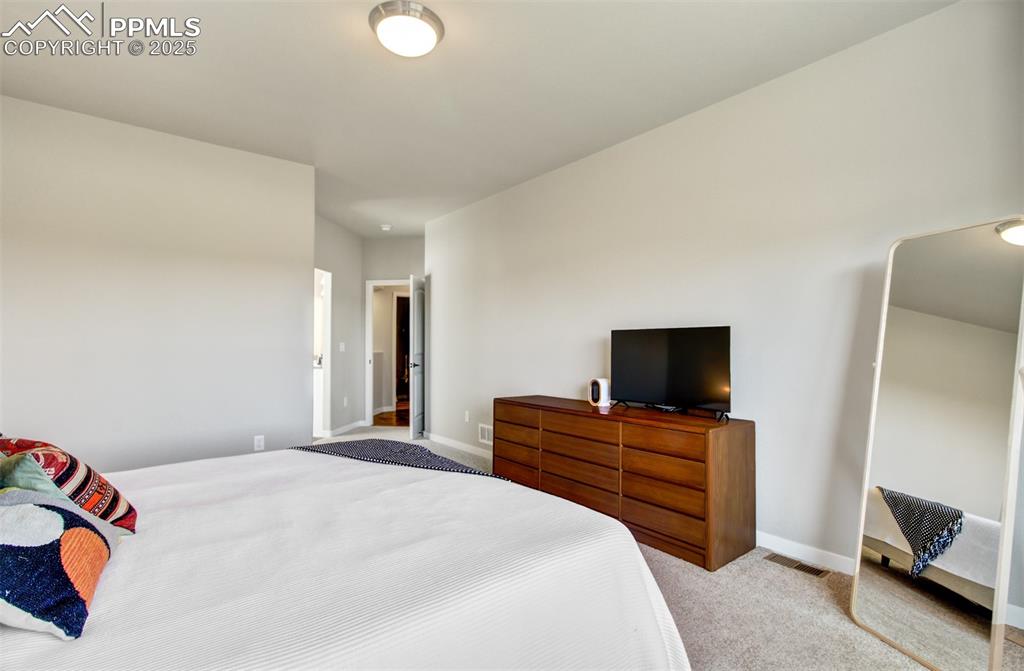 Image 15 of 38: Master Bedroom