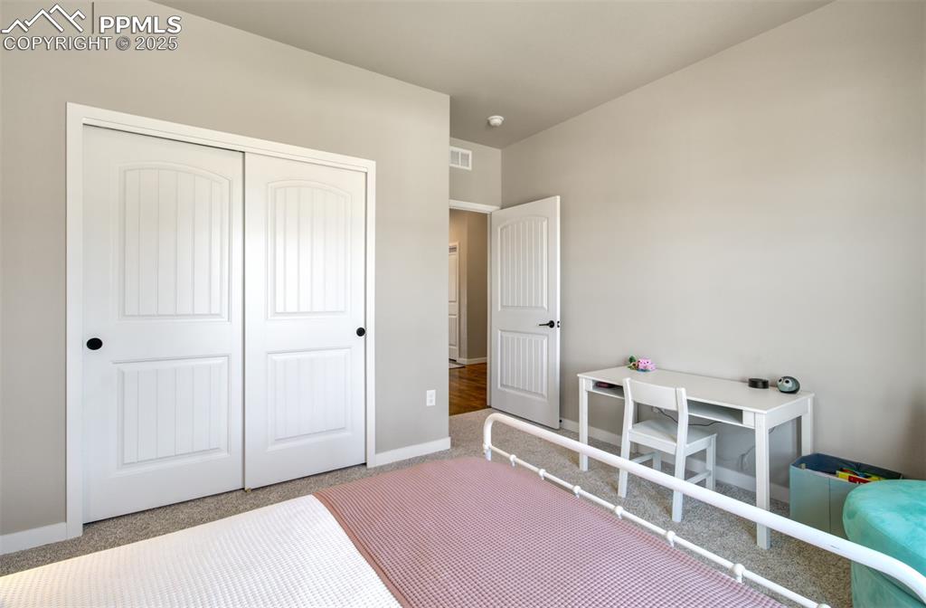 Image 19 of 38: Bedroom