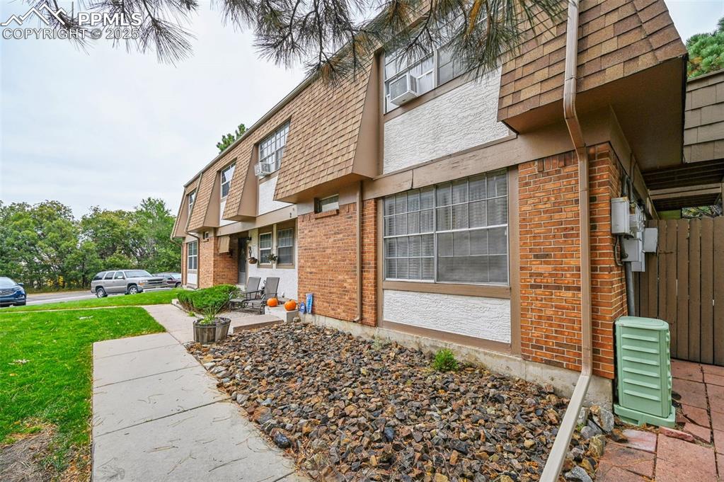 Image 3 of 21: View of building exterior with cooling unit