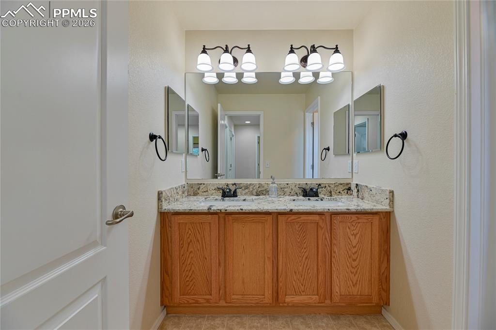 Image 27 of 34: Upstairs Bathroom 