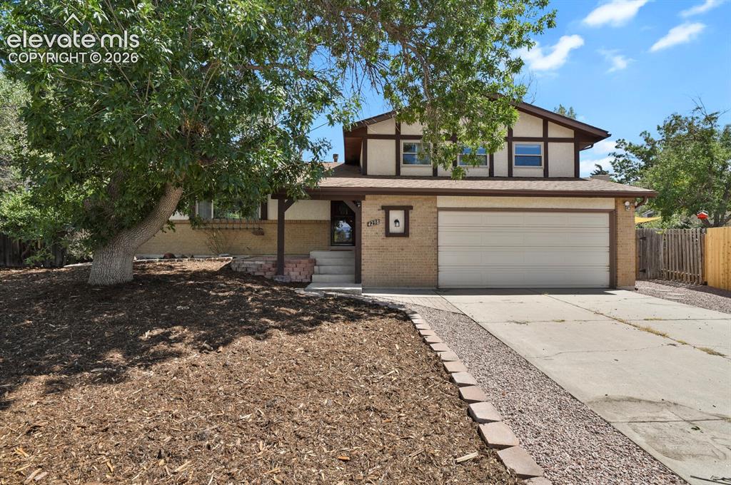 Caption: Brick and stucco exterior with decorative timber accents