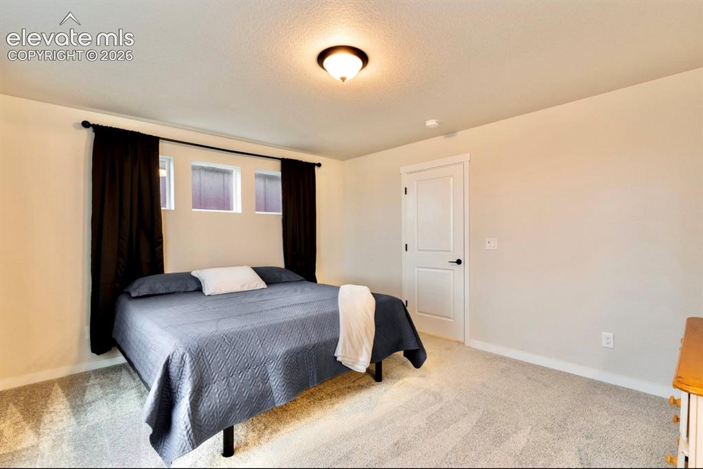 Image 13 of 33: Bedroom