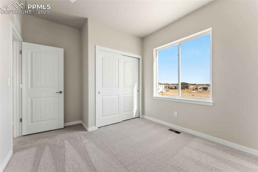 Image 21 of 32: Bedroom