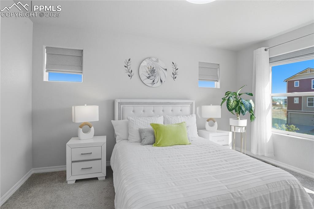 Image 13 of 31: PRIMARY SUITE WITH ADJOINING BATH