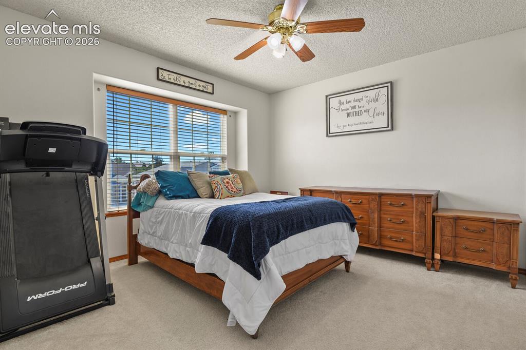 Image 25 of 44: 2nd, secondary upstairs bedroom.