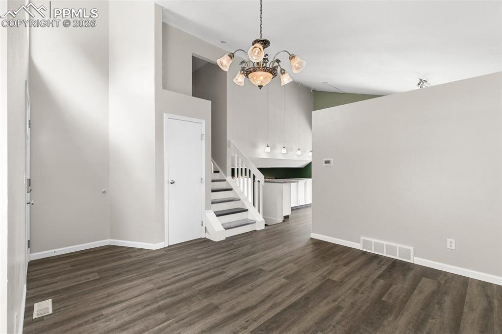 Image 3 of 26: From the front door facing the dining/kitchen area