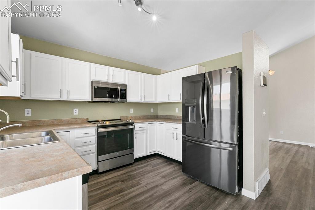 Image 9 of 26: Patio door to the left