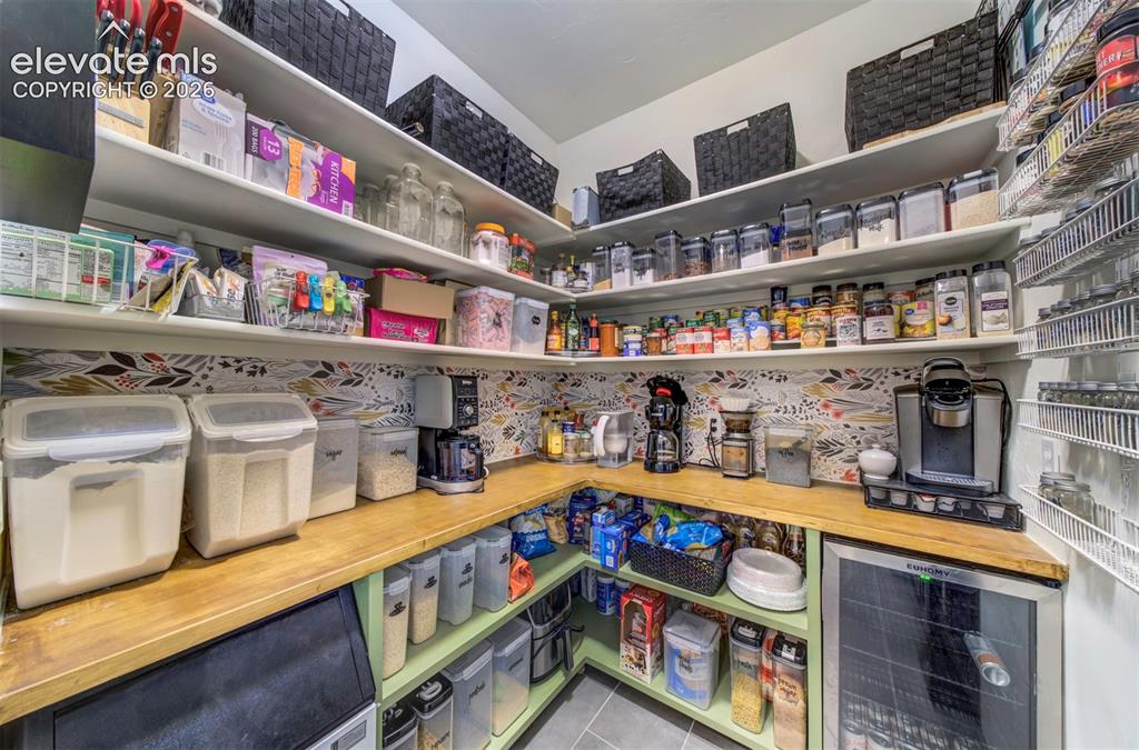 Image 9 of 44: Dream Pantry with Icemaker and mini fridge