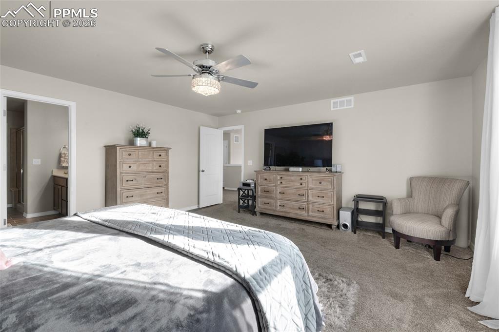 Image 23 of 39: Master Bedroom