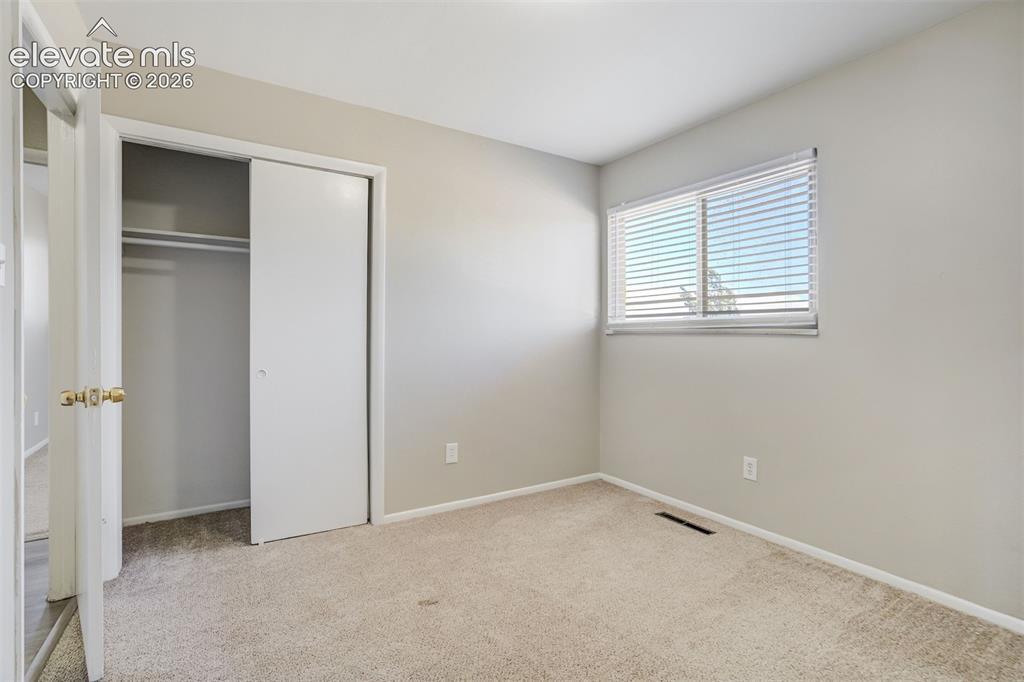 Image 19 of 39: Bedroom