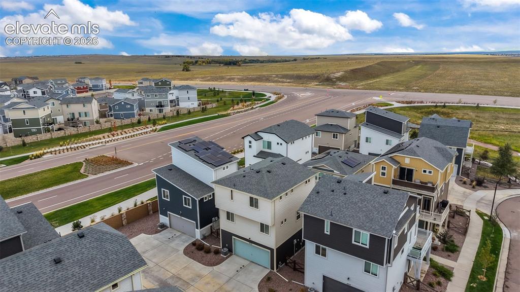 Image 33 of 34: Aerial perspective featuring multi-story residential architecture with shin