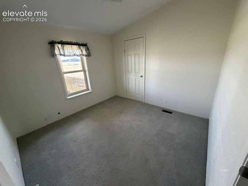 Image 12 of 19: Bedroom
