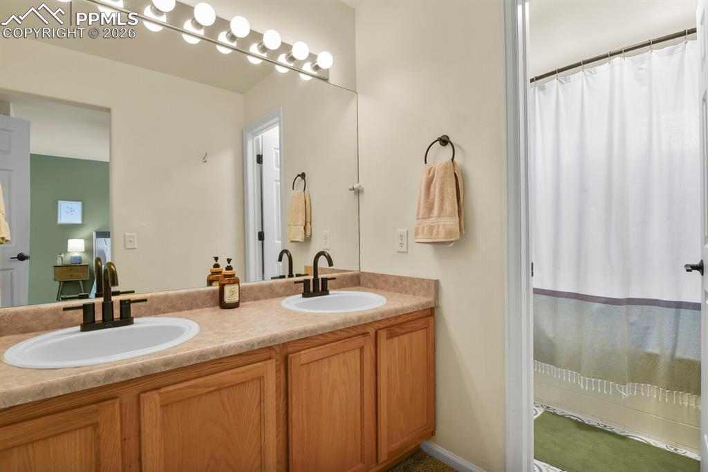 Image 19 of 30: Private bathroom in the primary bedroom