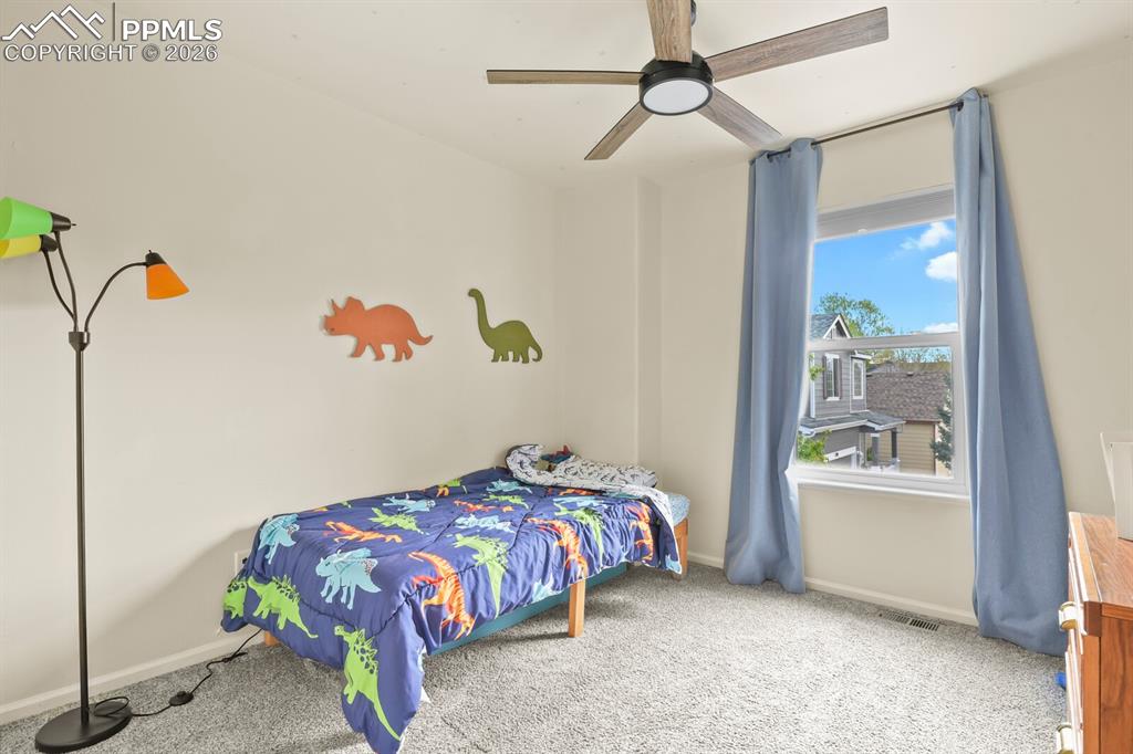 Image 20 of 30: 2nd bedroom upstairs