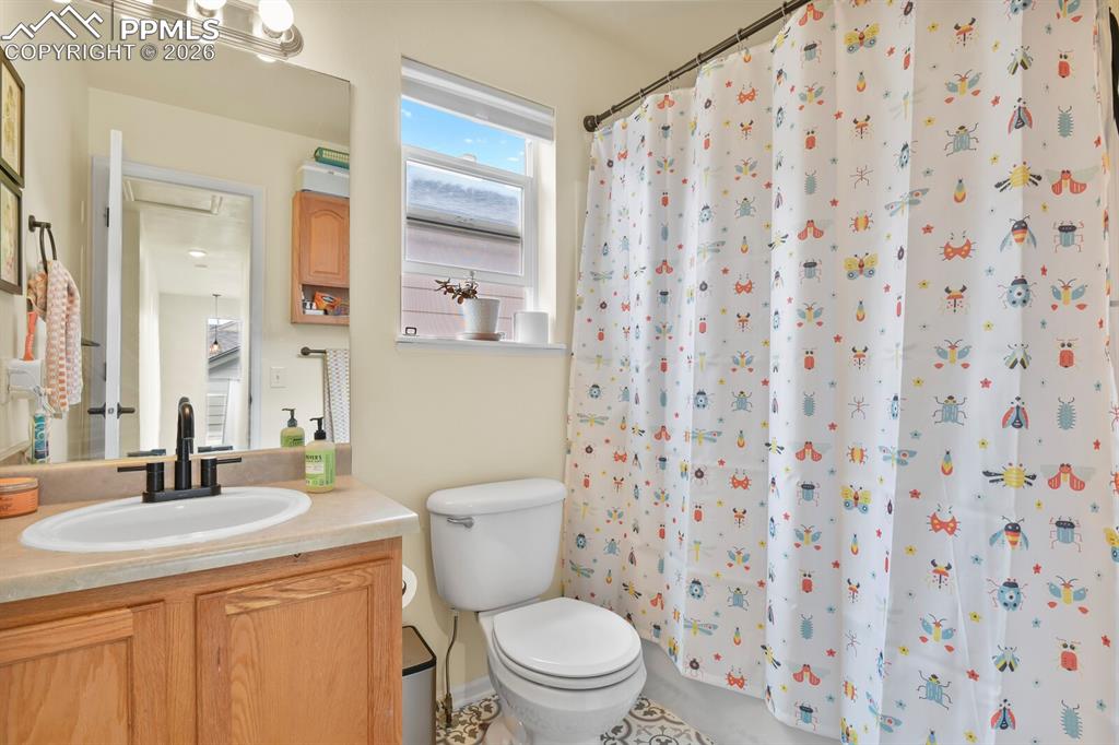 Image 22 of 30: Main bathroom on upper level