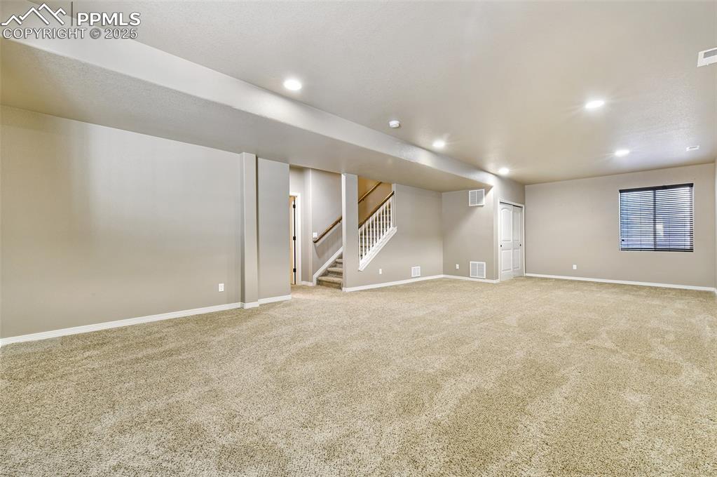 Image 25 of 35: enormous lower level family room