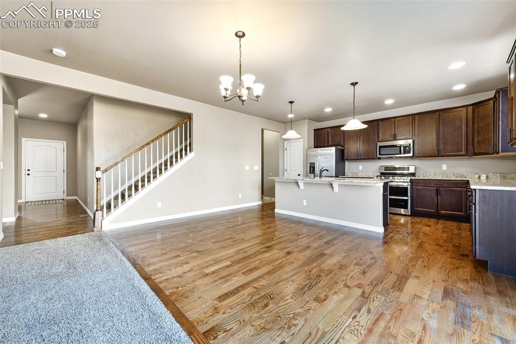 Image 9 of 35: island, extended height cabinetry