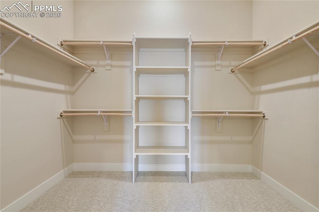 Image 18 of 35: Large walk-in closet