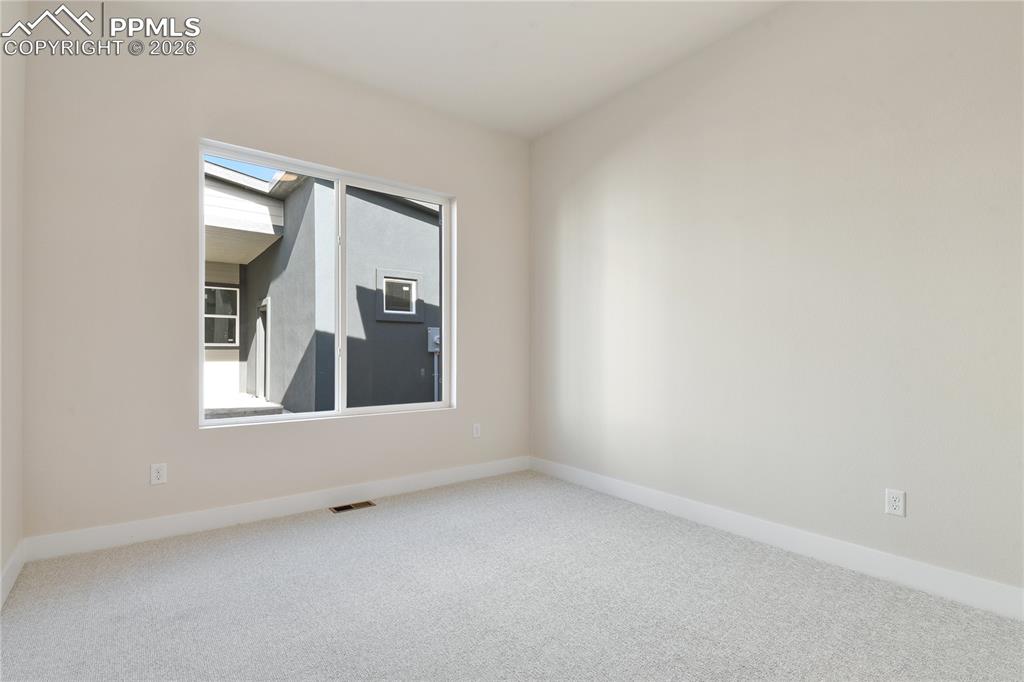 Image 39 of 42: 2nd main level bedroom