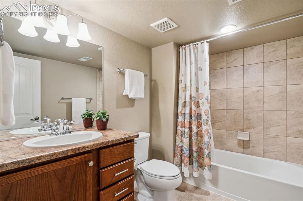Image 35 of 47: Lower Full Bath