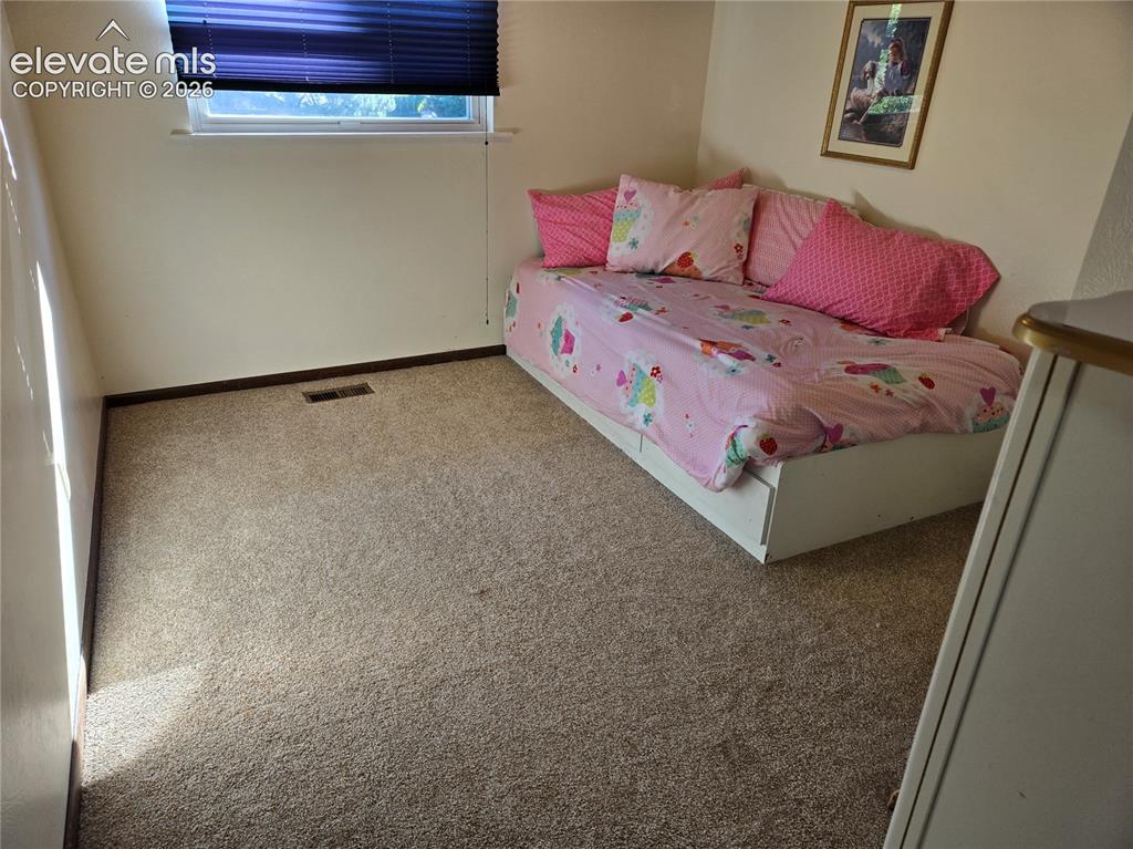 Image 11 of 21: Bedroom