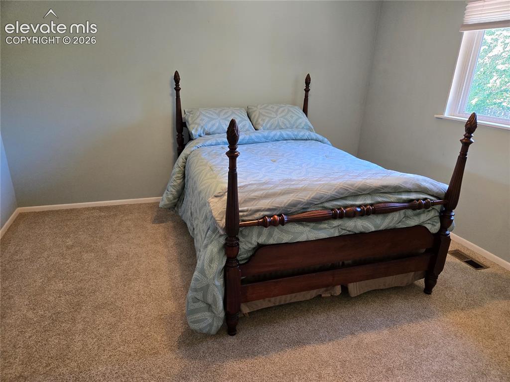 Image 12 of 21: Bedroom