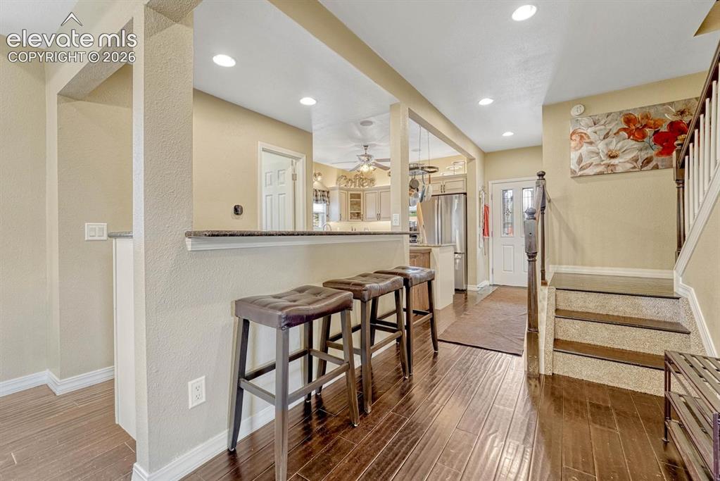 Image 10 of 50: Breakfast bar with bar-top seating