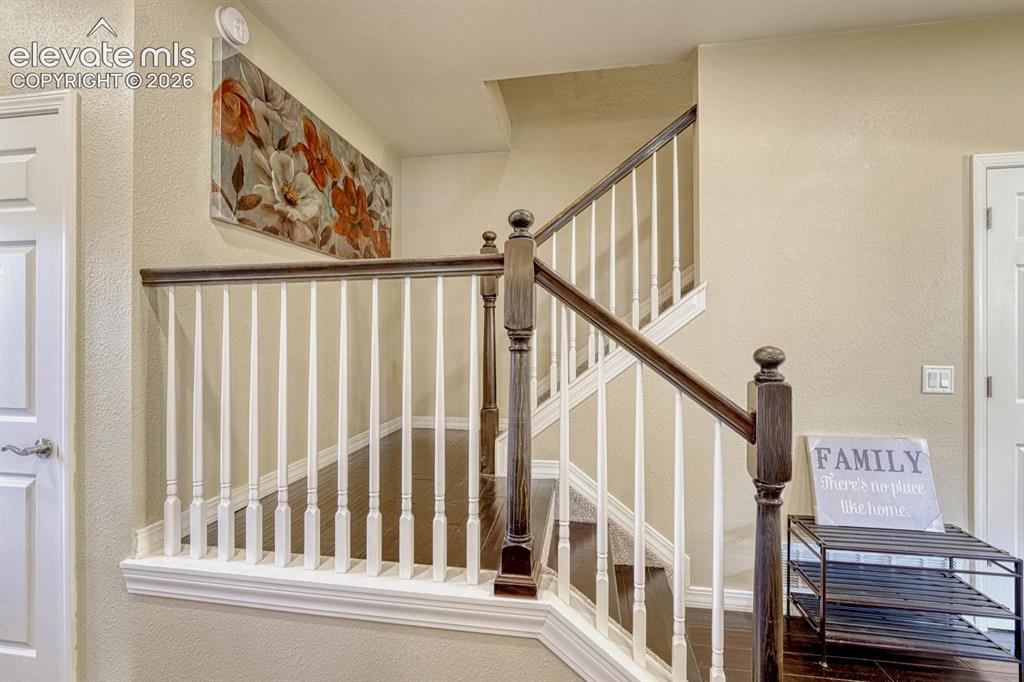 Image 19 of 50: Engineered hardwood on the stairs