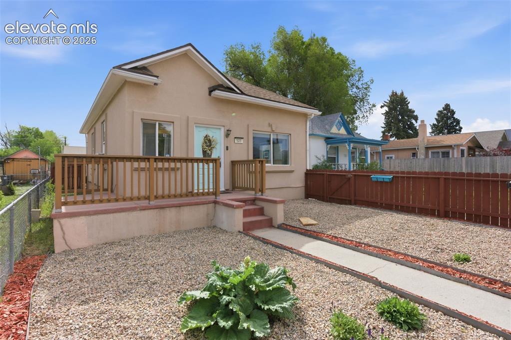 Image 1 of 27: Fenced front and back yards