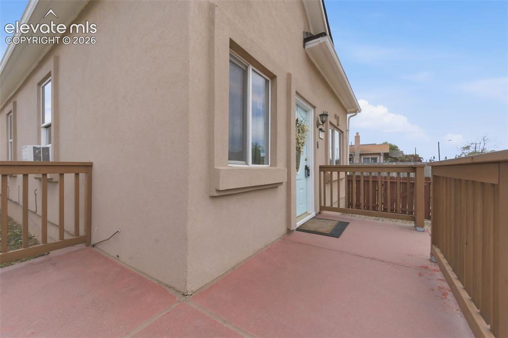Image 3 of 27: FRONT PORCH with view of Pikes Peak