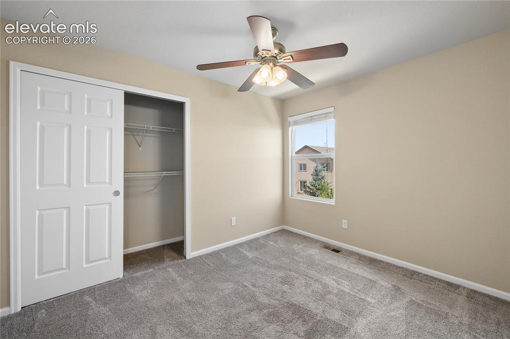Image 13 of 20: 1 of 3 bedrooms 