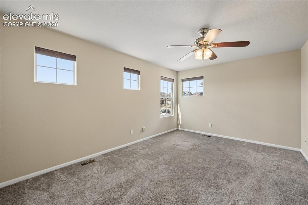 Image 15 of 20: Primary bedroom, attached 5-piece bathroom, walk-in closet