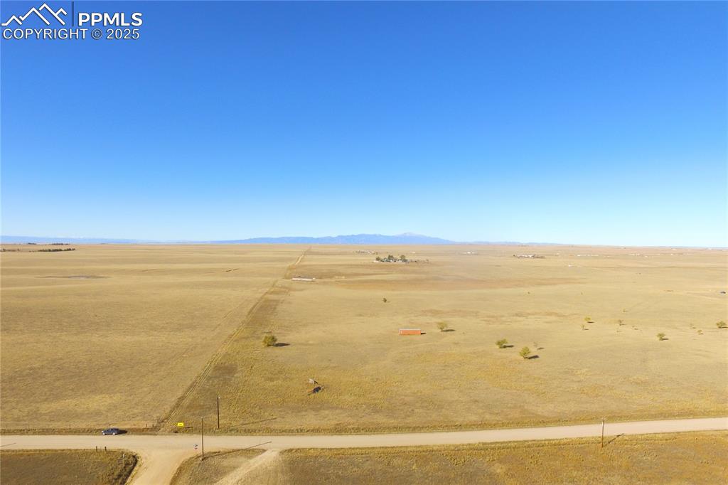 Image 5 of 21: View of rural area featuring a desert landscape and mountains