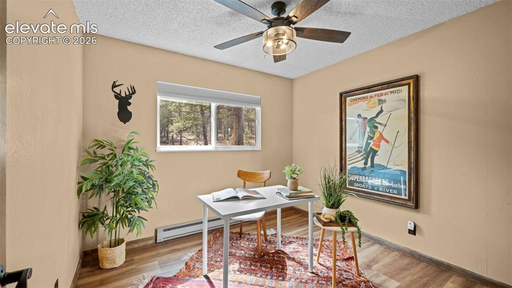 Image 19 of 43: Bedroom 2 with laundry space