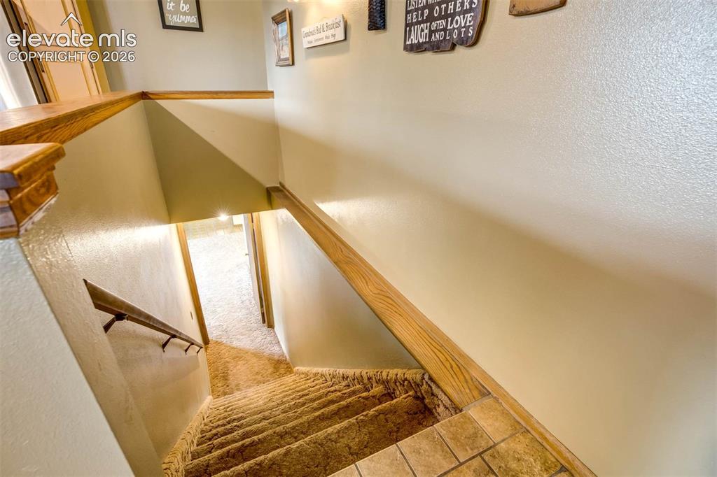 Image 25 of 48: bsmnt stairs frm kitchen