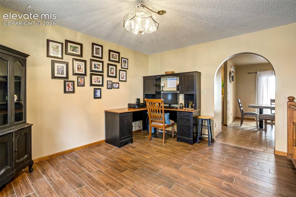 Image 6 of 48: bonus room area of LR
being used as an office space