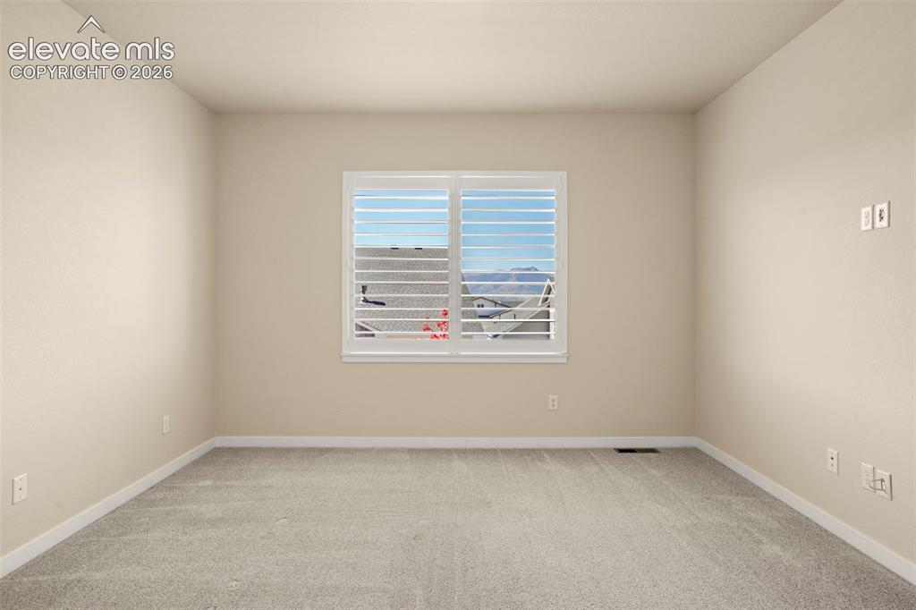 Image 20 of 50: Master Bedroom
