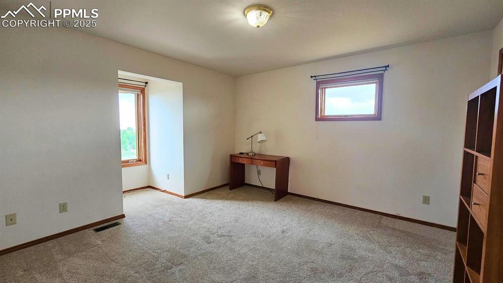 Image 19 of 28: Bedroom 3 - featuring carpet floors and baseboards
