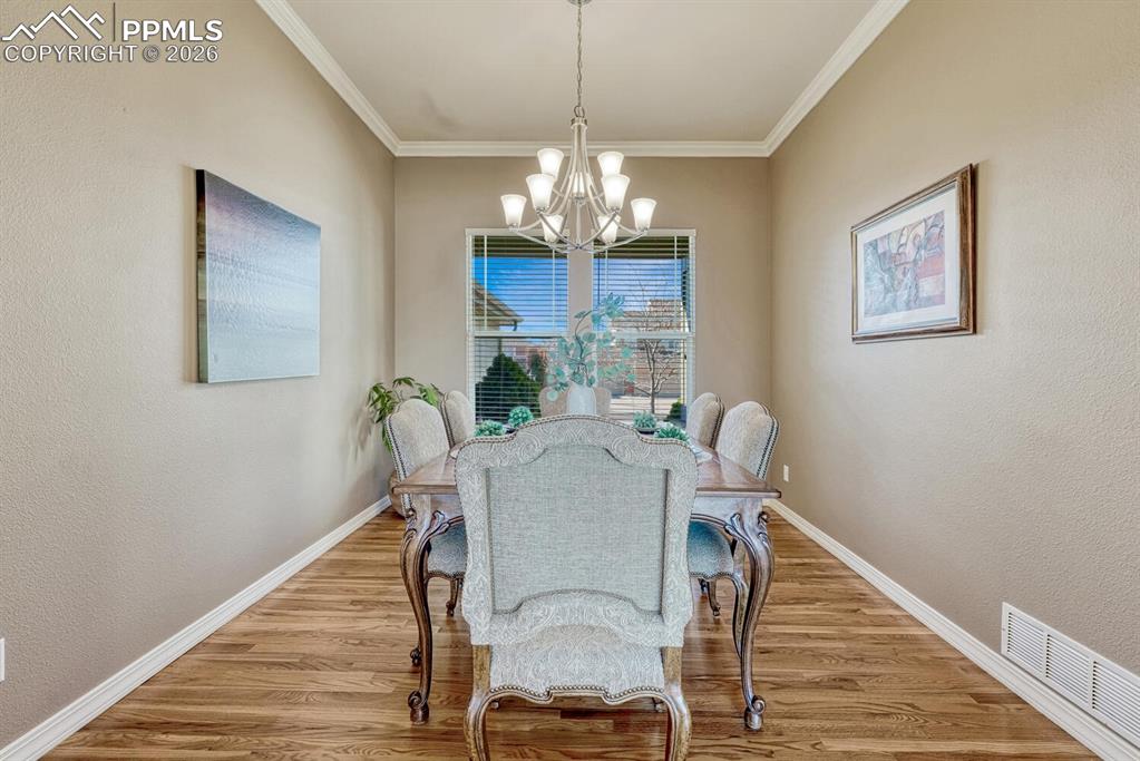 Image 15 of 49: Beautiful dining area open to living room