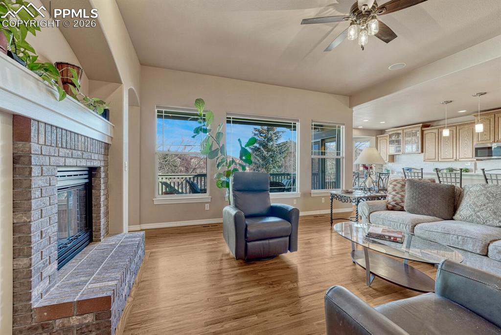 Image 3 of 49: Hardwood throughout main living spaces