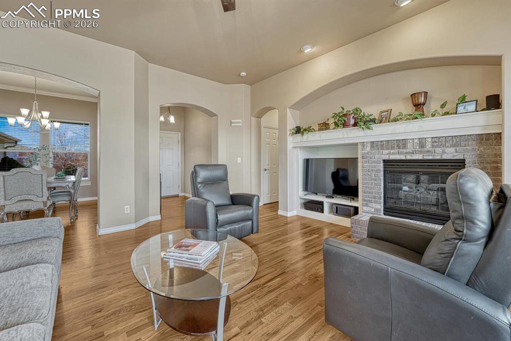 Image 7 of 49: Cozy Gas Fireplace on Main