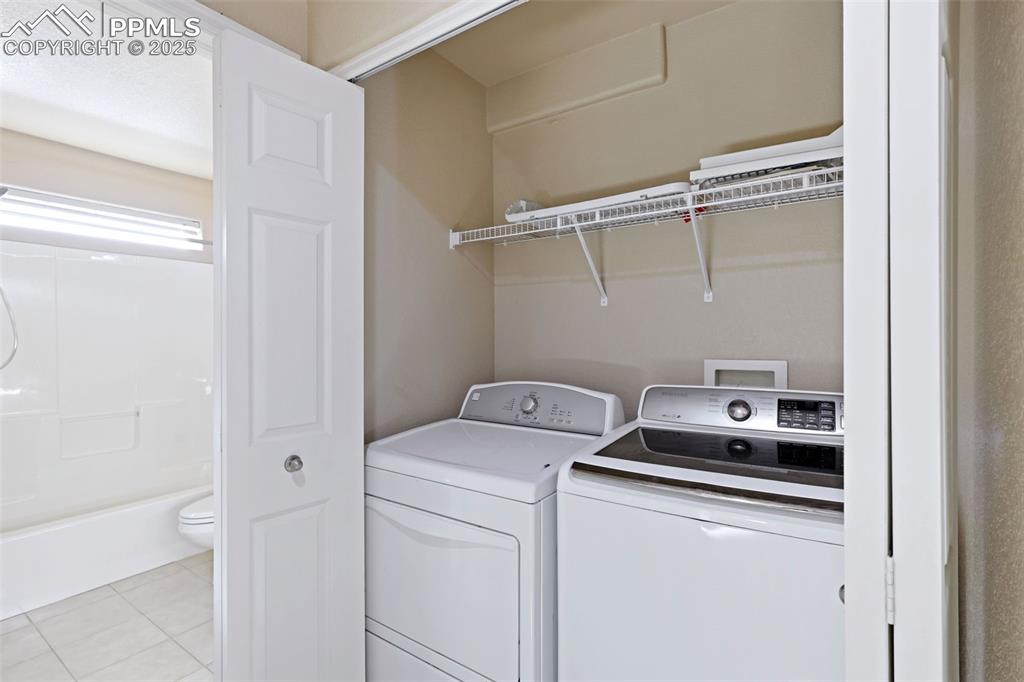 Image 19 of 37: Primary walk in closet