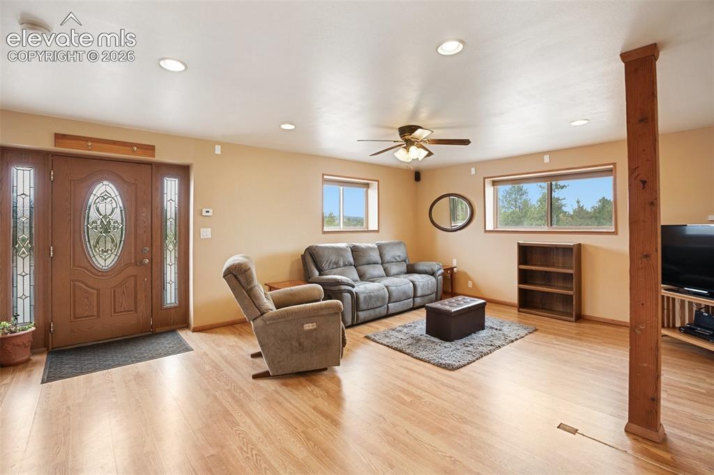 Image 37 of 49: Guest House Living room and kitchen.
