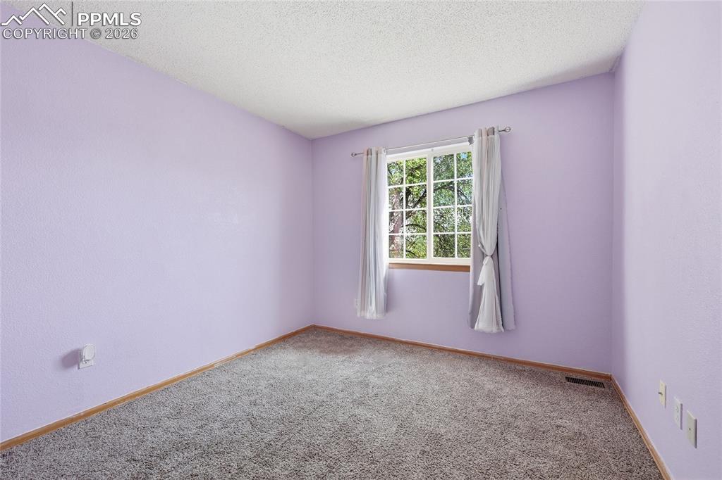 Image 13 of 40: bedroom one upstairs
