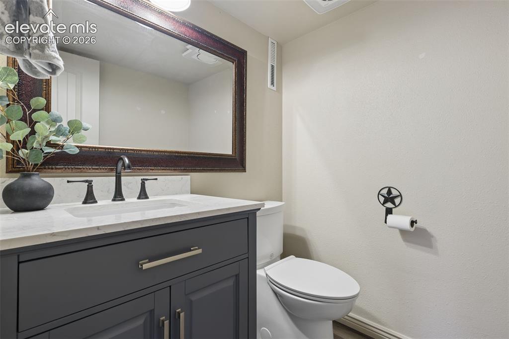 Image 20 of 32: Remodeled 1/2 Powder Bath in Lower Level